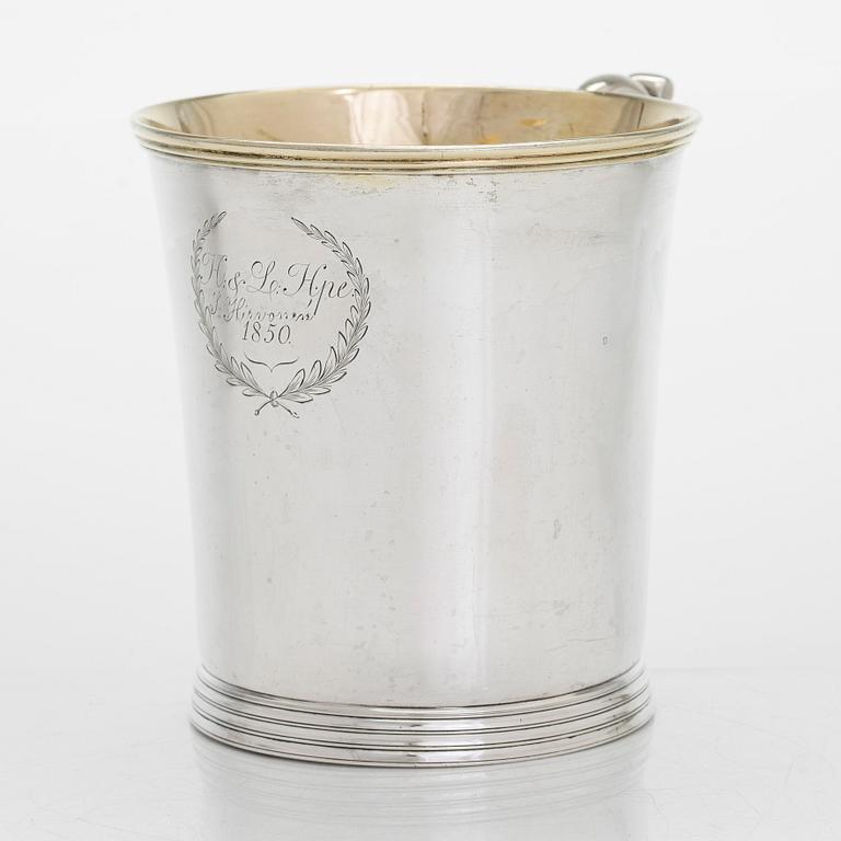 A mid-19th-century parcel-gilt tankard, maker's mark of Roland Mellin, Helsinki 1849.