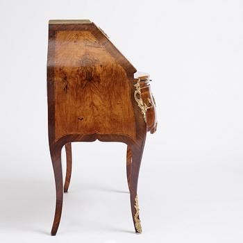 A rosewood, walnut, and gilt brass-mounted rococo secretaire by J. H. Reimers (master in Stockholm 1754-73).