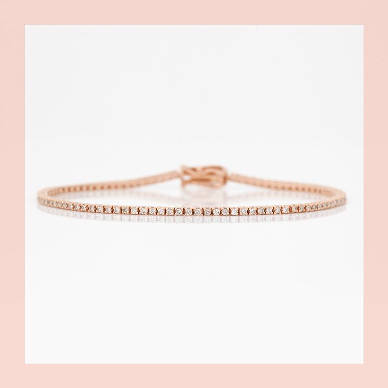 ARMBAND, ett riviére i rosa guld med briljanter, totalt ca 0.99ct.