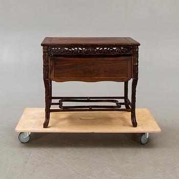 An Asian 20th century serving table.