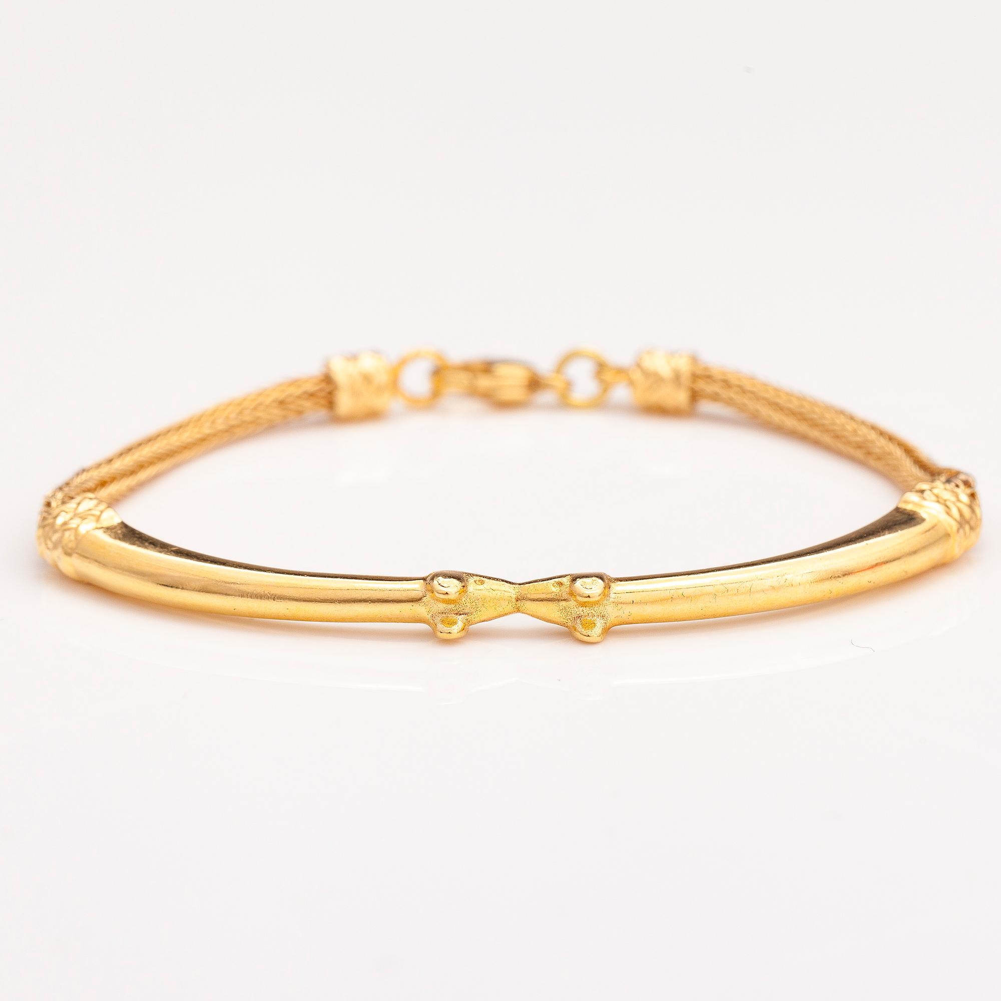 An 18K gold bracelet "Moose head", Kalevala koru 1999.