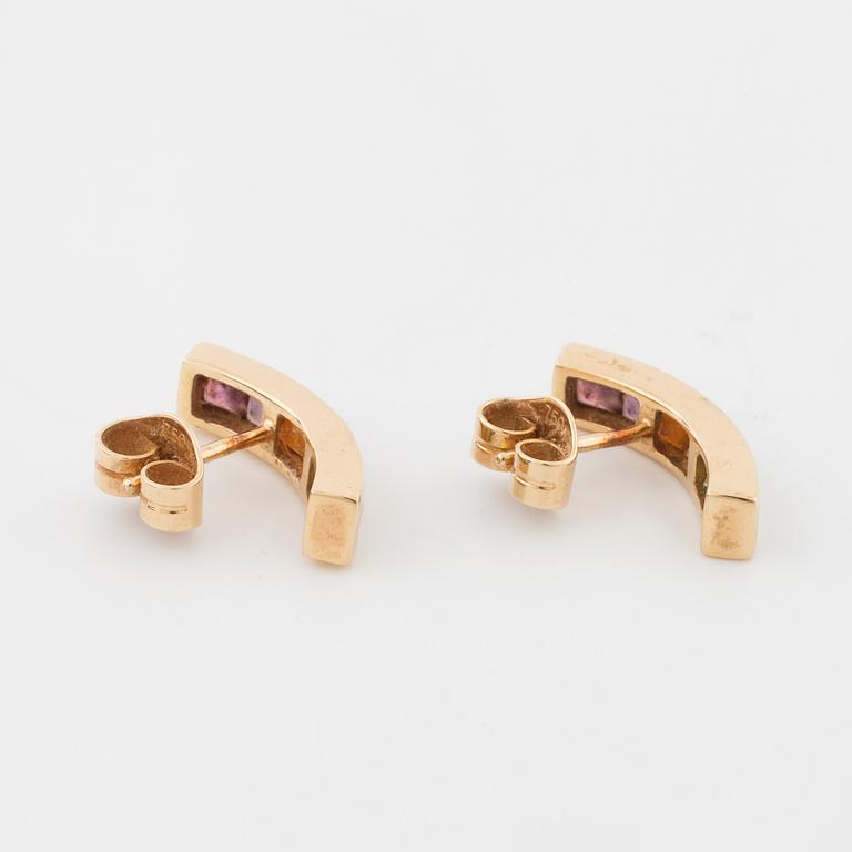 A multicolored gemstone pendant and a pair of earrings, "Collection Rainbow” by H. Stern.