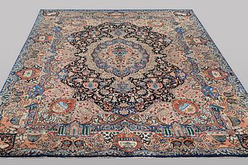 A Kashmar carpet, c. 392 x 296 cm.