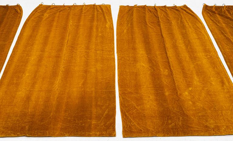 A set of four yellow velvet curtains, 1910's/20's, ca 247 x 120 cm.