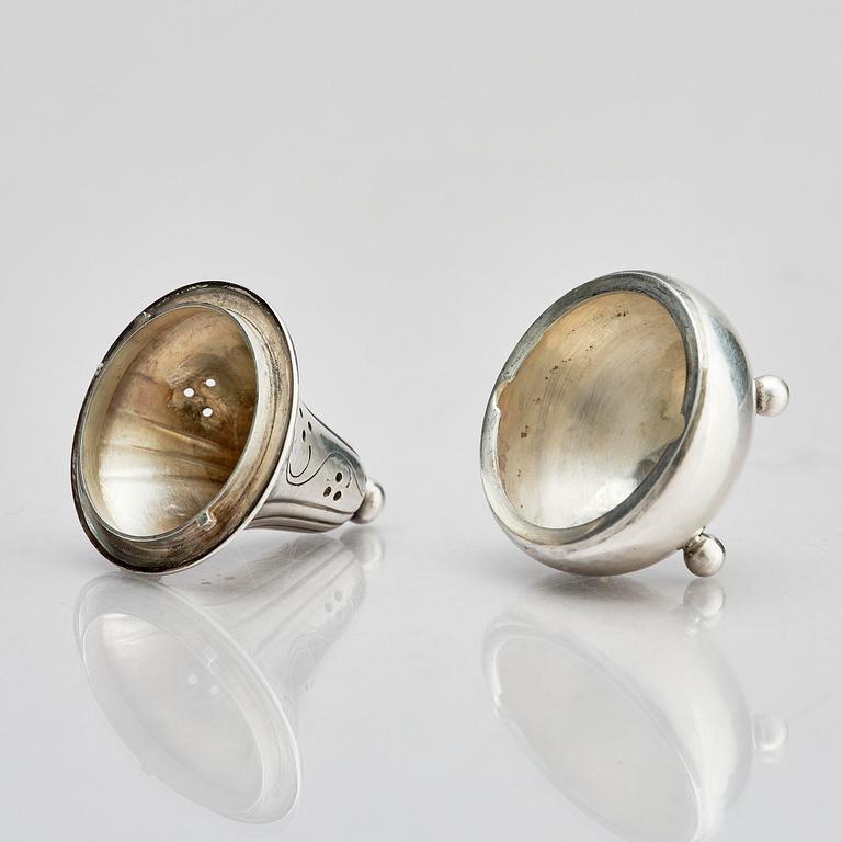 Georg Jensen, four sterling silver casters, design Harald Nilesen, Copenhagen 1933-44, one Copenhagen after 1945.