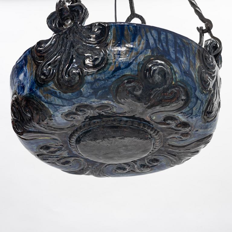 A Swedish Art Nouveau ceramic and iron ceiling light, Höganäs, early 20th century.
