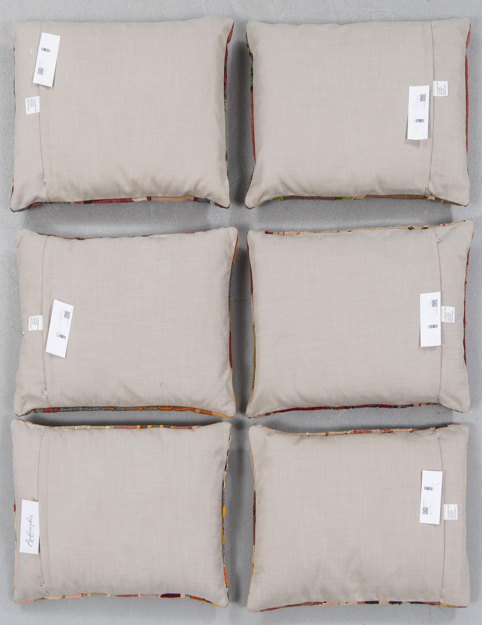 Six kelim pillows.