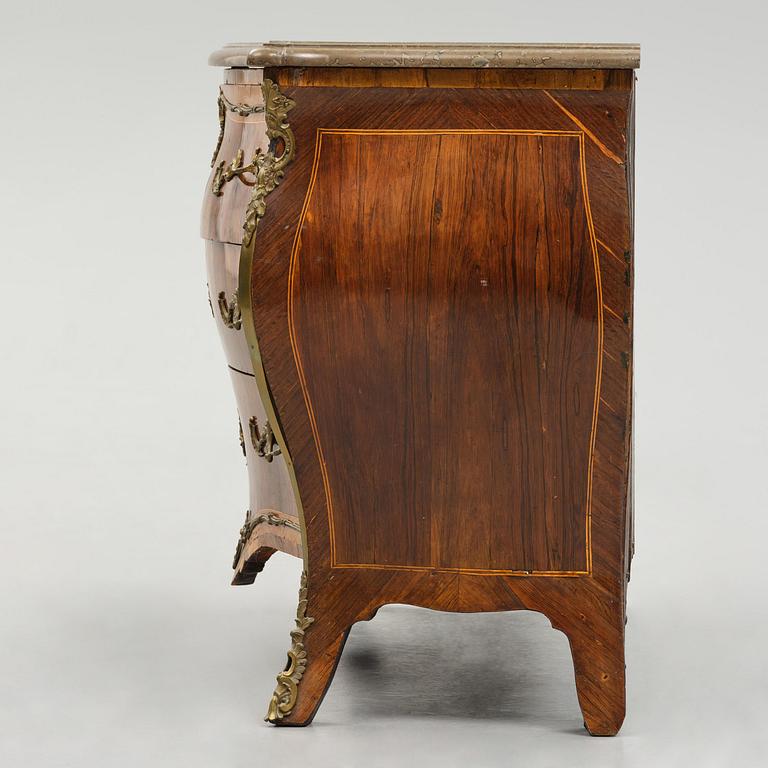 A rococo parquetry commode by C. G. Willkom (master in Stockholm 1763-65).