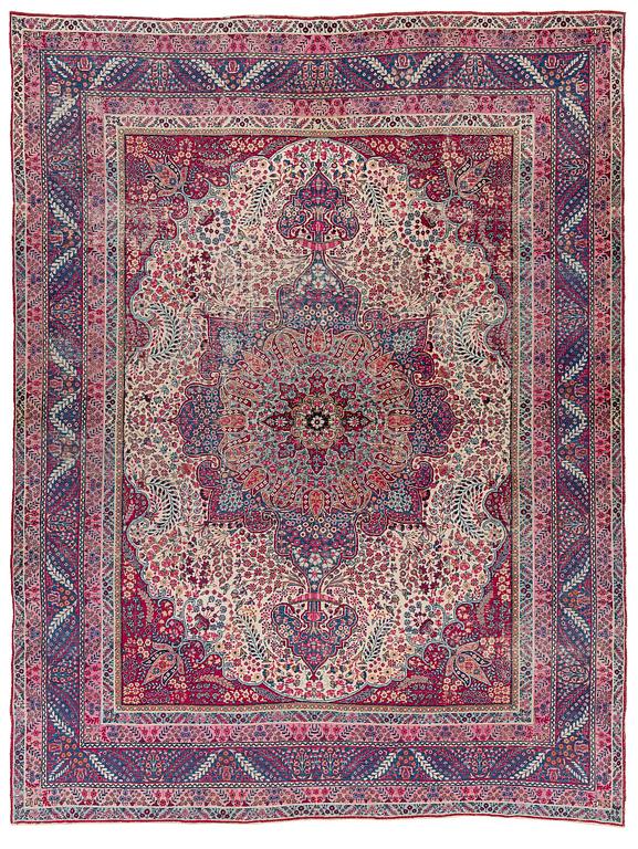 A semi-antique Kirman carpet, South Persia, c. 380 x 289 cm.