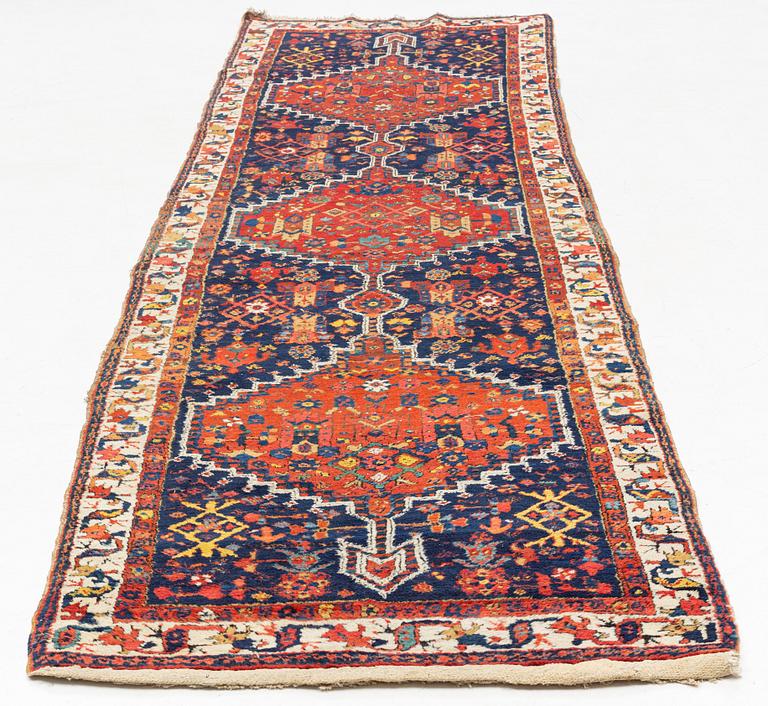 An antique runner, probably Karadja, circa 360 x 98 cm.