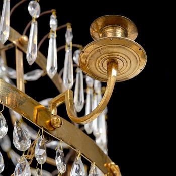 A late Gustavian gilt brass and cut glass seven-light chandelier, Stockholm, late 18th century.