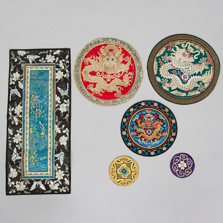 A Chinese embroidered silk robe and a buzi and five other silk embroideries, early 20th century.