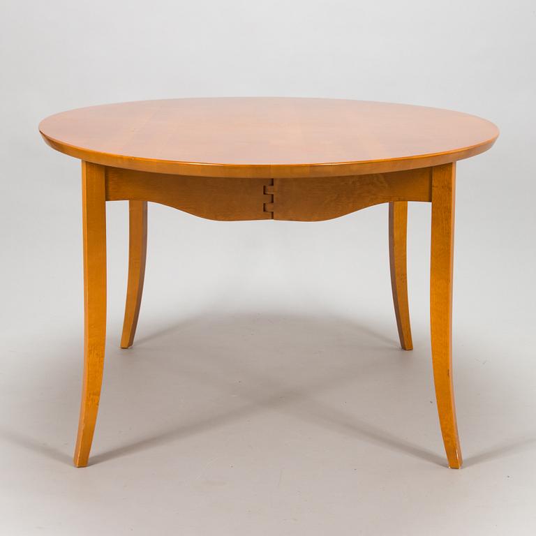 Kimmo Varjoranta, a 9-piece 'Kaiku' dining set retailer  Sope Kaluste. In production 1985-1995.
