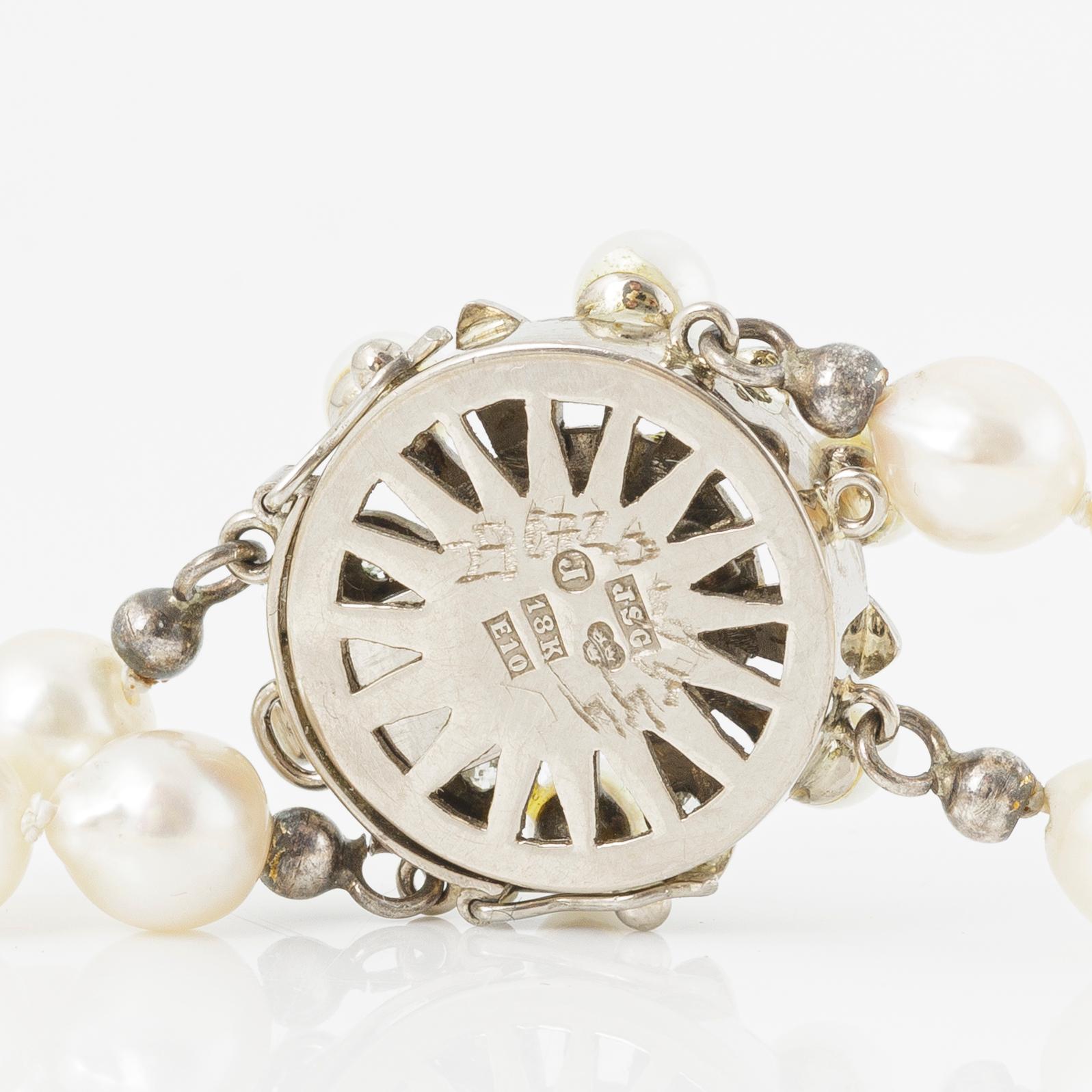 Necklace, cultured pearls, clasp 18K gold with cultured pearls and diamonds, JSG, Jönköping 1979.