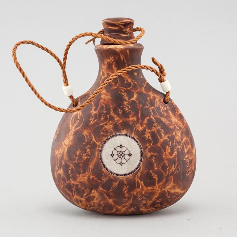 A flask by Roger Saitton, signed RS and dated 2008.