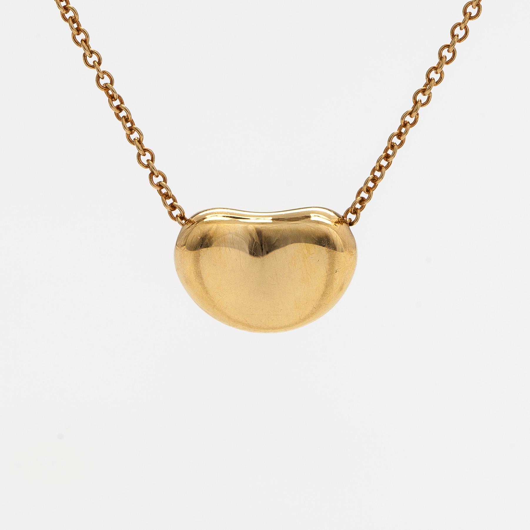 Tiffany & Co, Elsa Peretti, an 18K gold 'Bean' necklace.