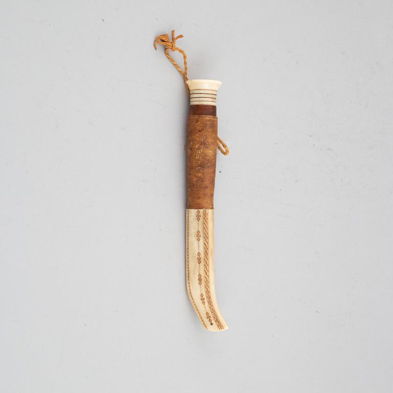 Lars Levi Sunna, a Sami reindeer horn knife, signed.