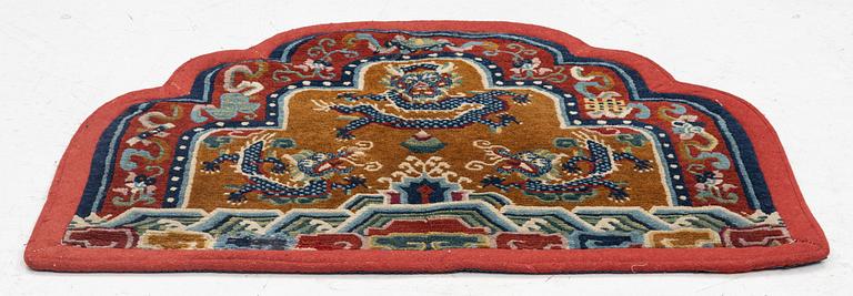 An Antique Tibetan throne rug, c 66 x 81 cm.