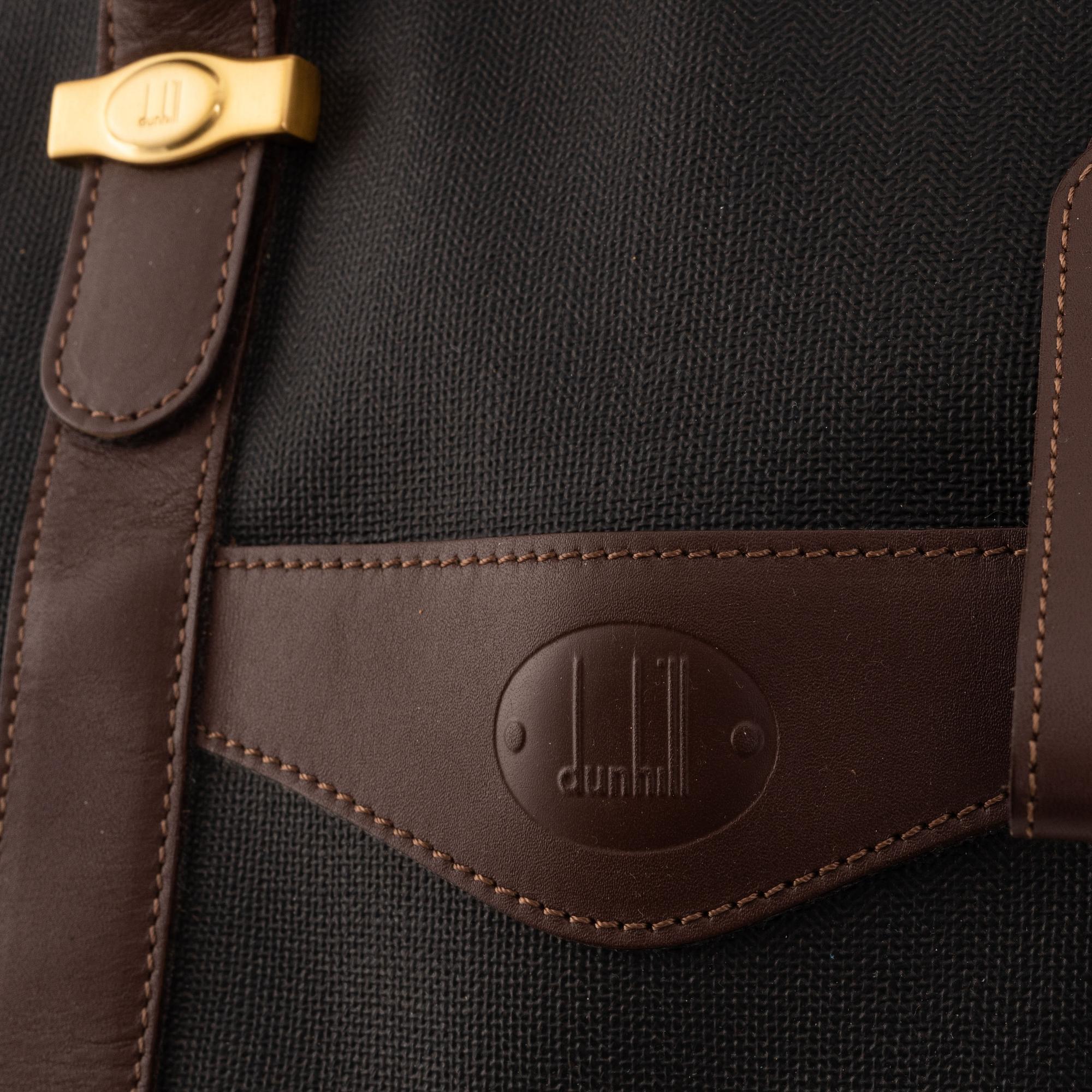 Dunhill, a coated canvas weekend bag. - Bukowskis