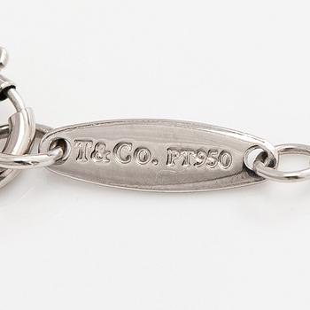 Tiffany & Co, Elsa Peretti, a platinum 'Diamonds by the Yard' bracelet with a brilliant-cut diamond.