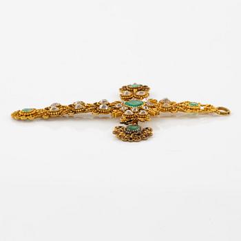 A cross in 14K gold set with faceted emeralds and old-cut diamonds, likely 18th century.