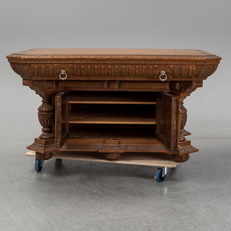 An oak library table, 1890's.