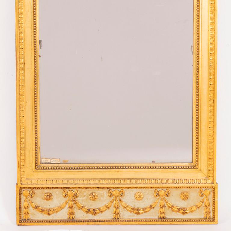 A late-Gustavian giltwood mirror, Stockholm, late 18th century.