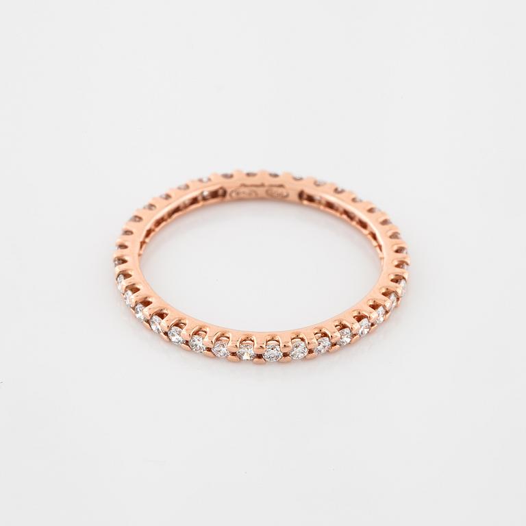 A brilliant cut diamond ring.