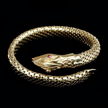 ARMRING, 18k guld. Vikt 39g.