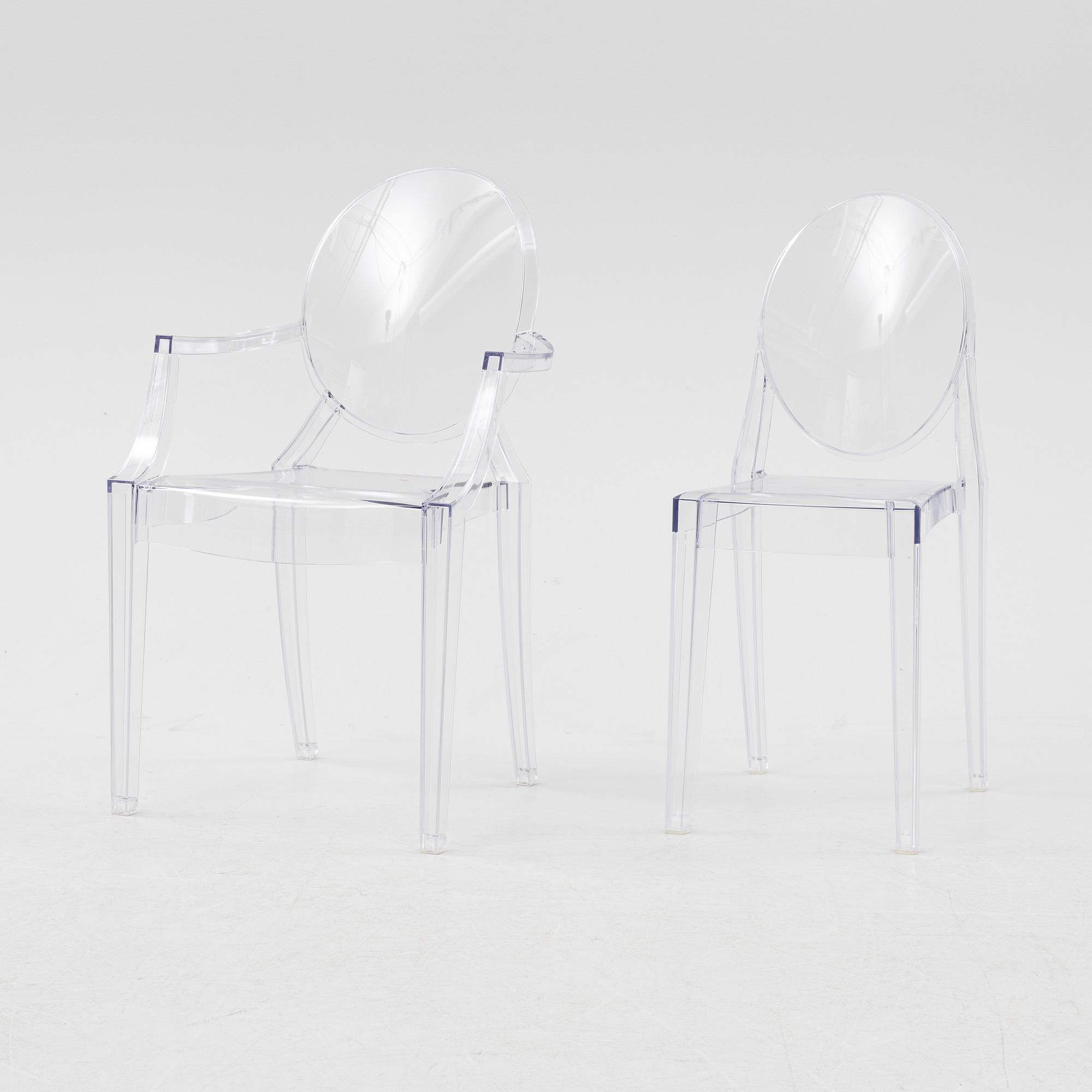 A 'Louis Ghost' armchair and 'Victoria Ghost' chair by Philippe Starck, Kartell.