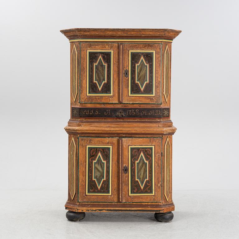 A painted pine cabinet, 18th Century.