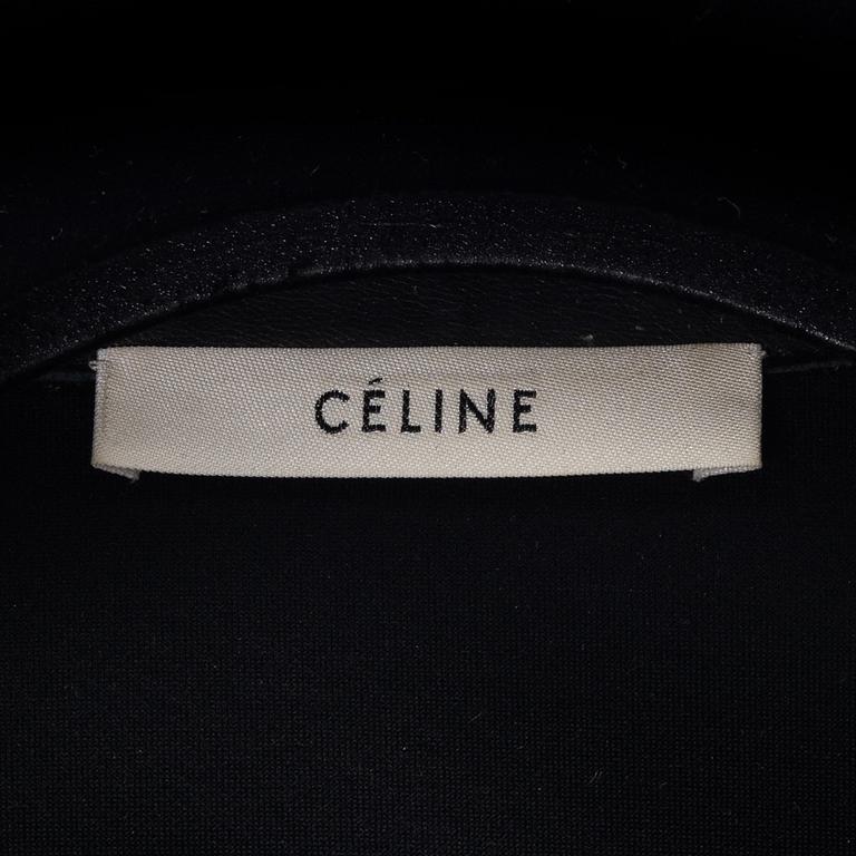 Céline, A black leather jacket, size 38.