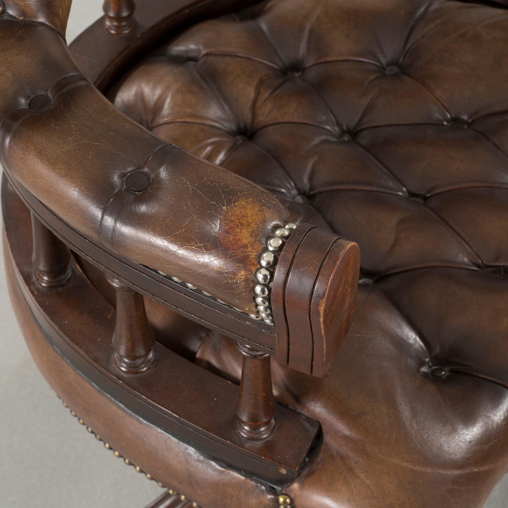 A desk chair in English style, made in the second half of the 20th century.