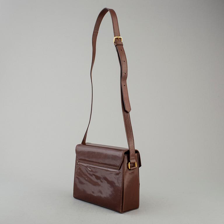 ESCADA, a brown leather handbag.