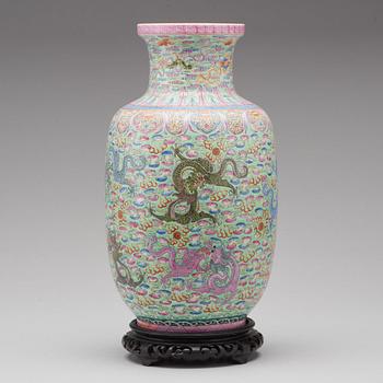 A famille rose and green ground vase, Republic (1912-49), with Qianlong six character mark.