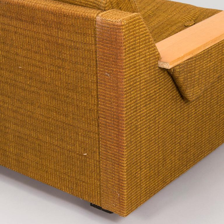 A pair of 1970s armchairs.