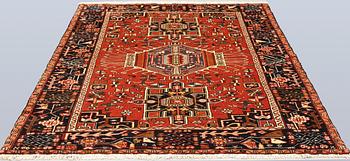 A Heris rug, approx. 191 x 157 cm.