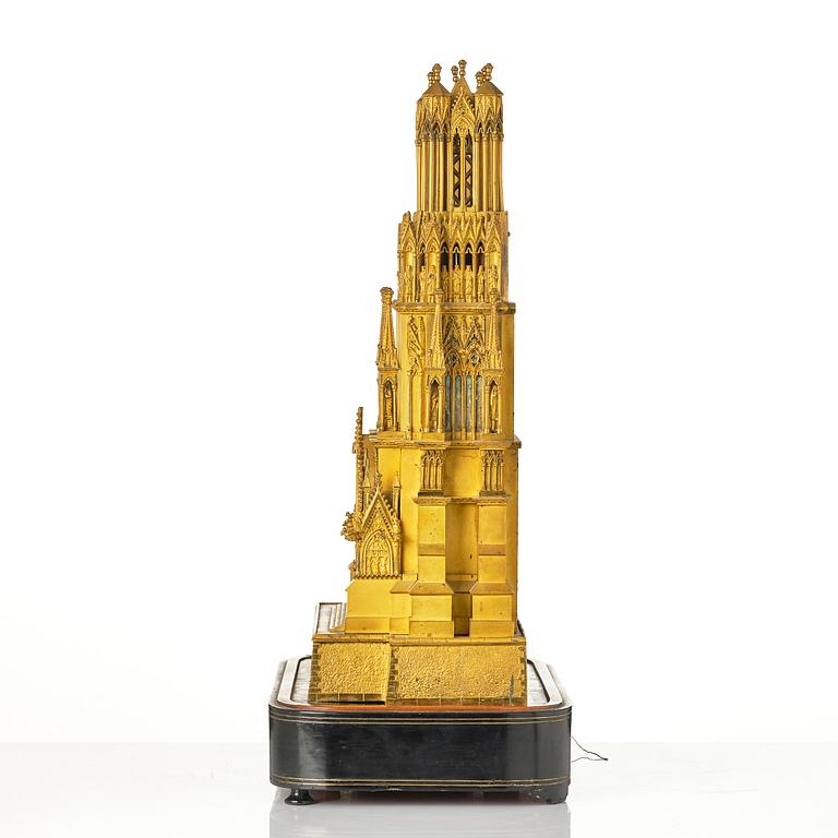 A Charles X ormolu mantel clock modelled as the Cathedral of Reims, Paris, 1820's.