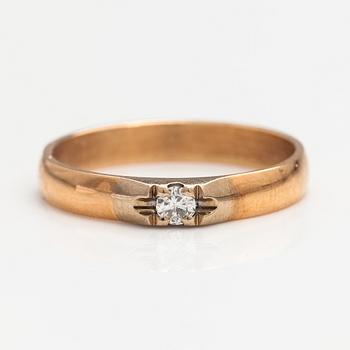 A 14K gold ring with a ca. 0.10 ct diamond. Finland 1993.