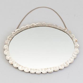 a silver mirror, probably by Carlo Camuso, Italy, mif 20th century.