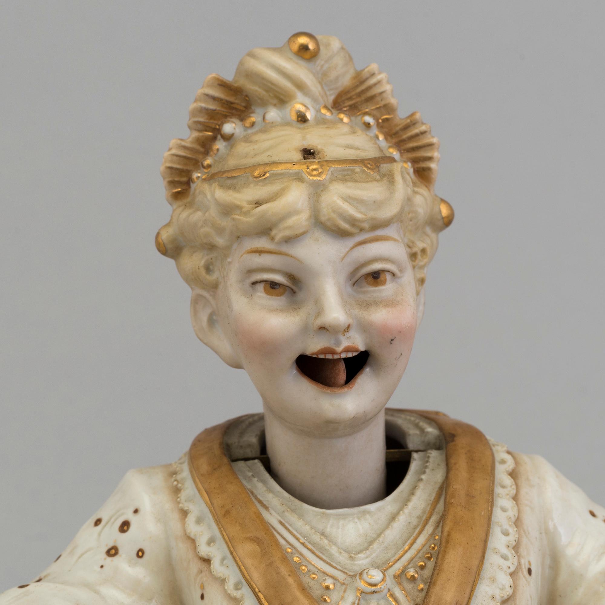 A pair of Chinese style 20th century porcelain nodding figures.