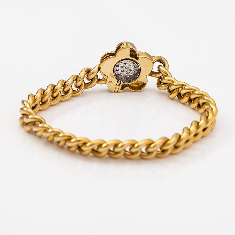 A 14K gold flower bracelet with diamonds ca. 0.38 ct in total. Finnish import marks 1966.
