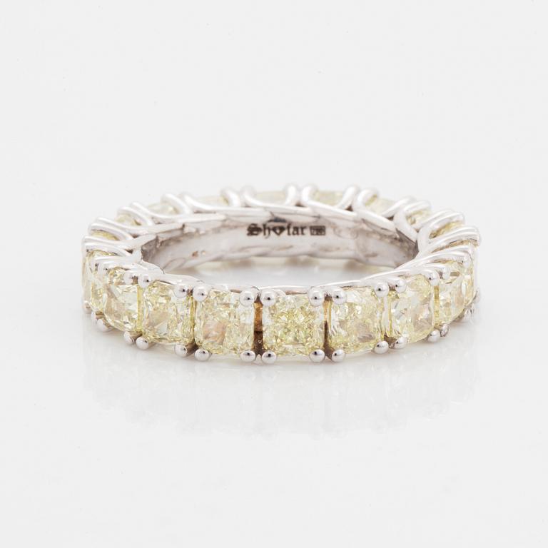 Cuschion-cut diamond eternity ring.