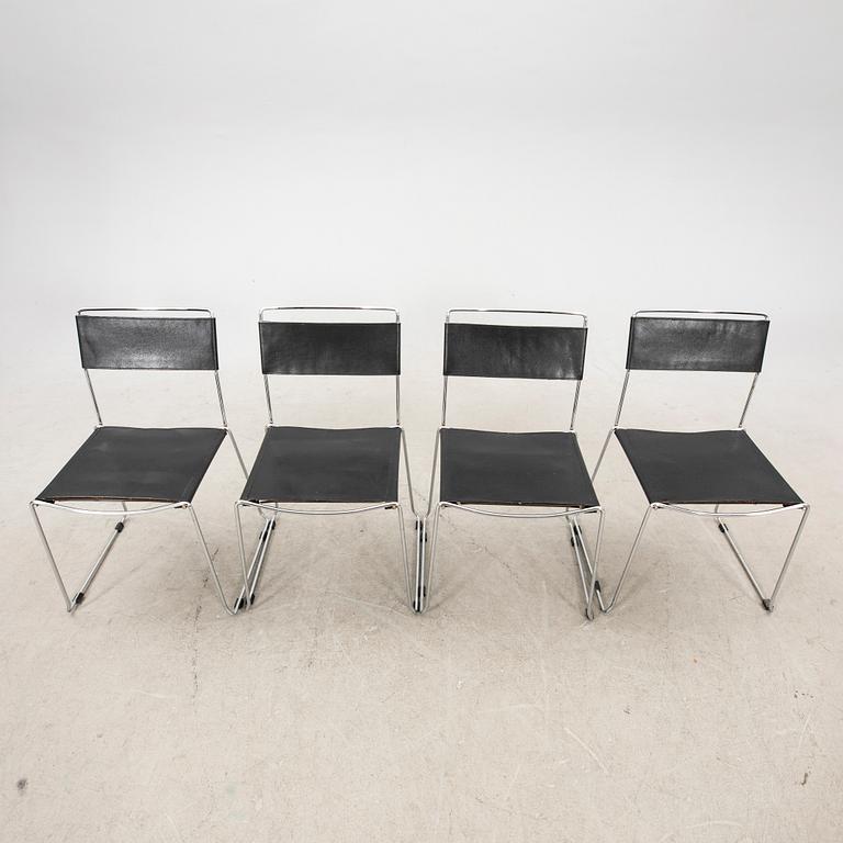 A pais of leather and chrome metal chairs from the second half of the 20th century.