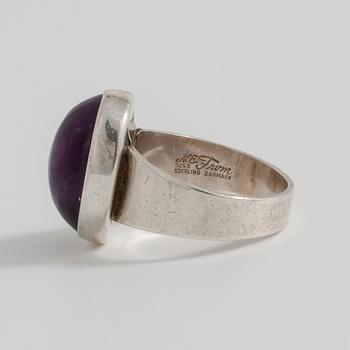 NIELS ERIK FROM, Nakskov, Denmark, a cabochon cut amethyst ring.