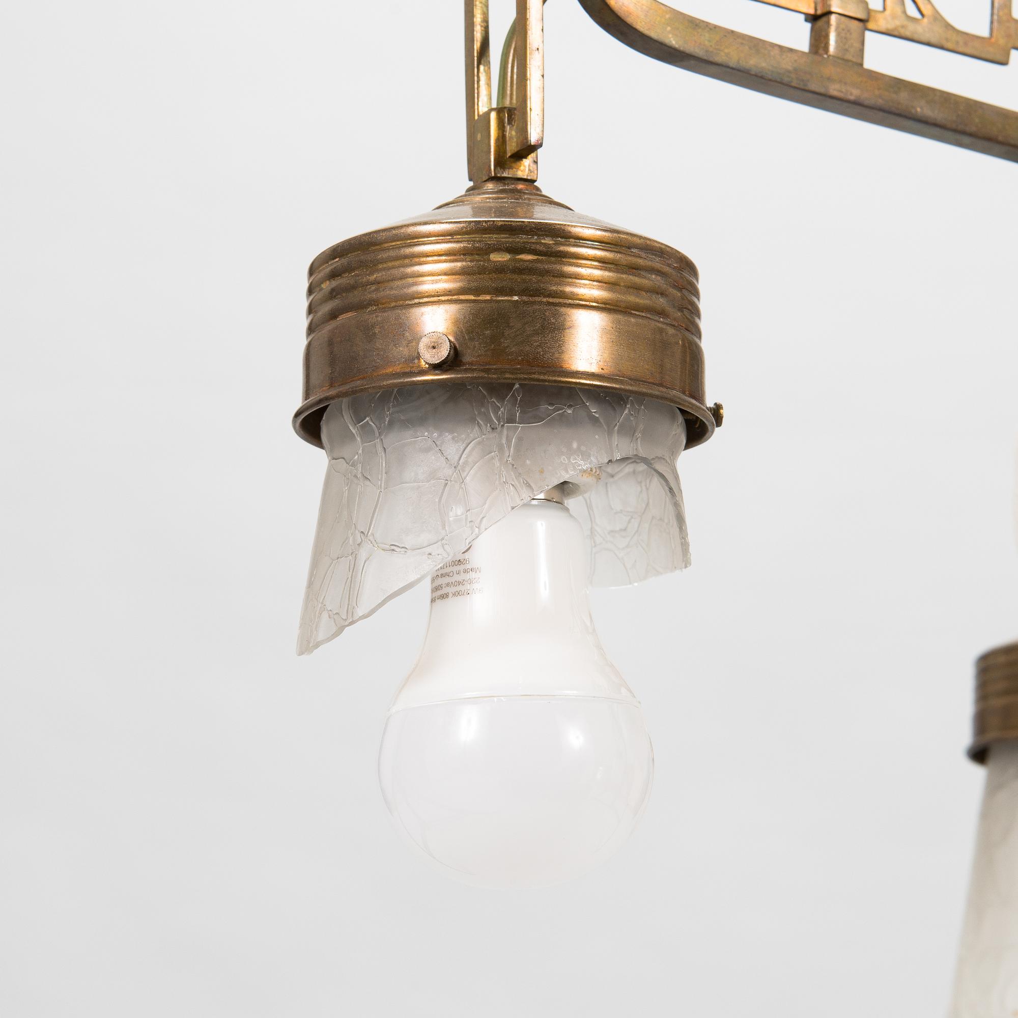 A Jugend style patinated bronze pendant ceiling light from the early 1900s.