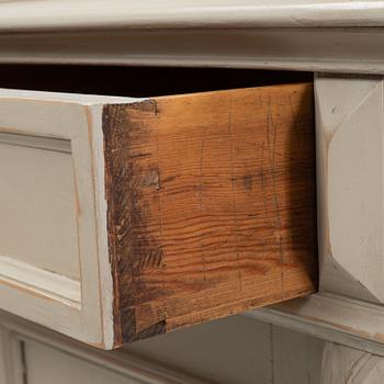 A painted cabinet from around the year 1900.