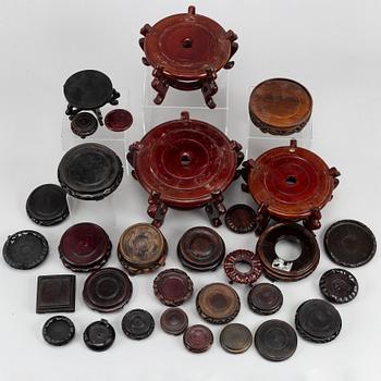 31 Chinese wooden stands of different sorts, 20th century.