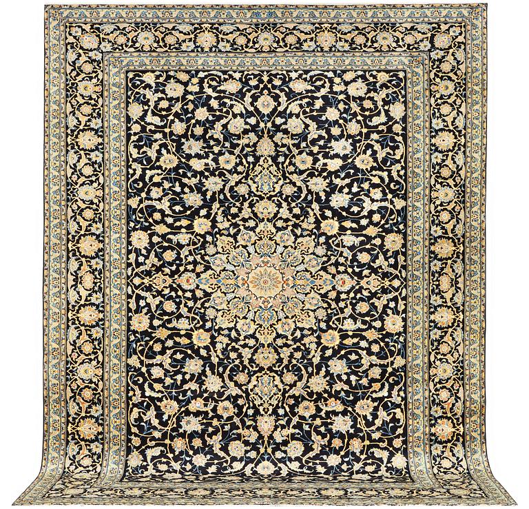 A Kashan carpet, a. 381 x 292 cm.