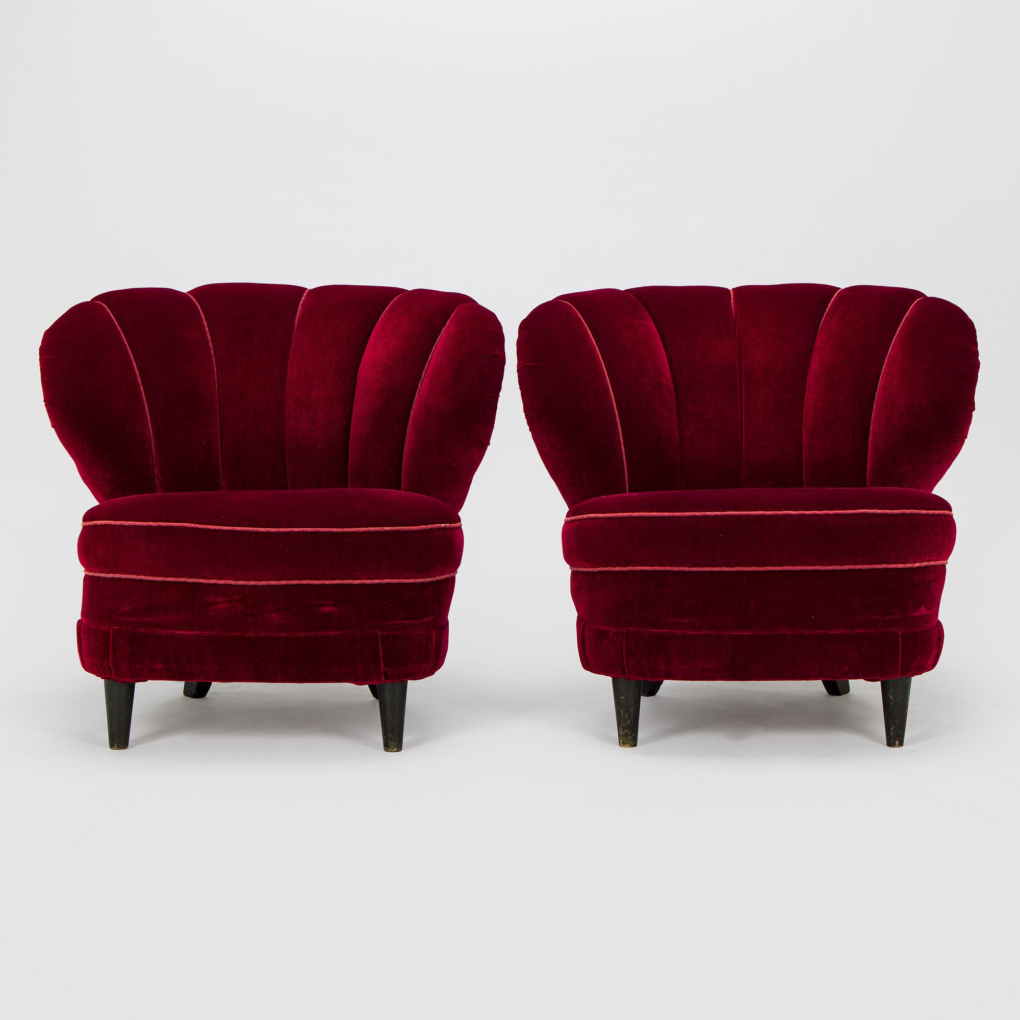 A pair of mid-20th century armchairs.